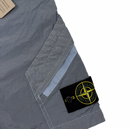 Pantalón Cargo Corto Stone Island nylon metal celeste - talla W/30 / W/32