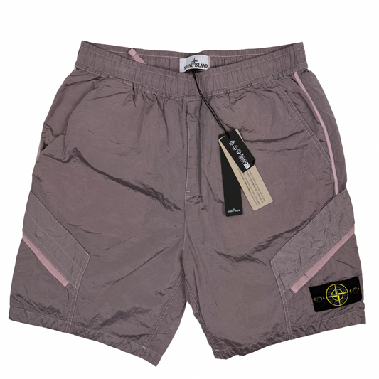 Pantalón Corto Stone Island  nylon metal rosa - talla W/28 / W/34