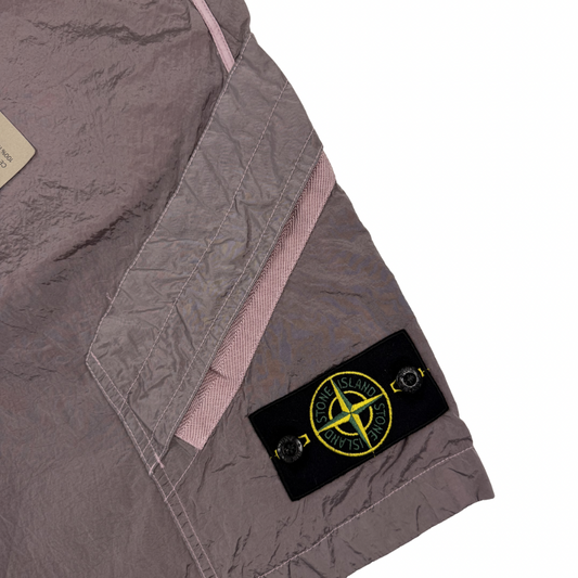 Pantalón Corto Stone Island  nylon metal rosa - talla W/28 / W/34