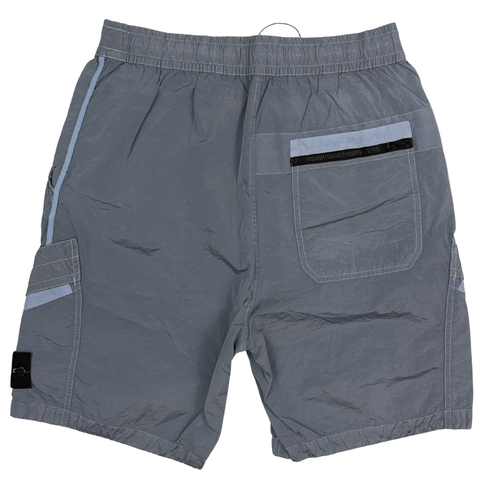Pantalón Cargo Corto Stone Island Celeste nylon metal - talla W/30 / W/32